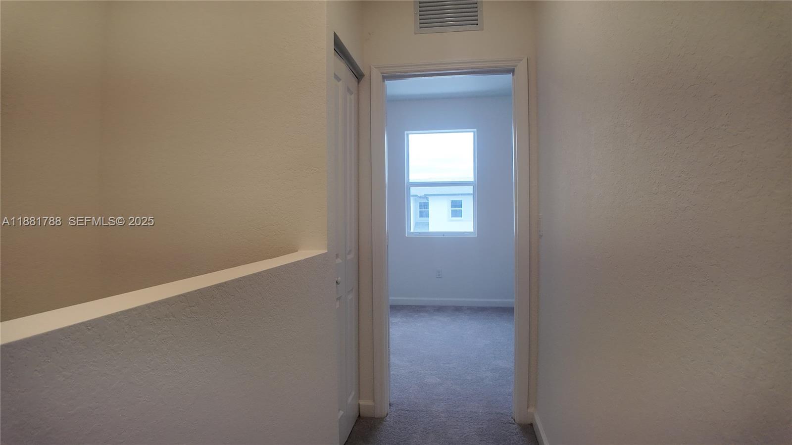 35761 Southwest 178th Court, Unit 35761 Homestead, FL 33034 - Photo 51 of 80 a view of hallway with window