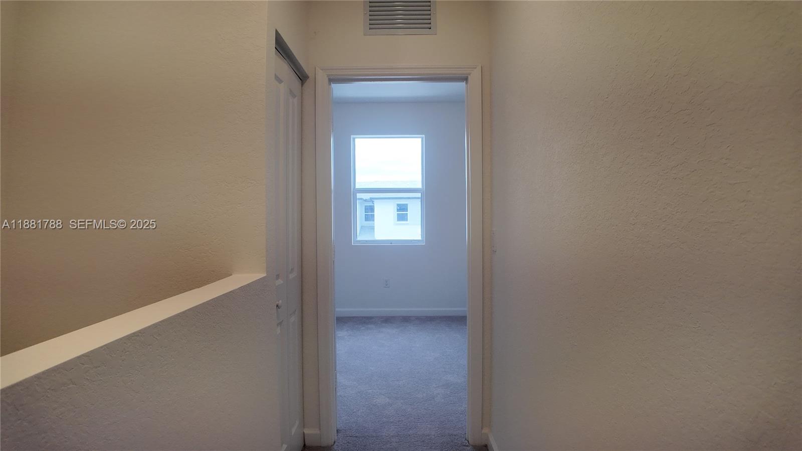 35761 Southwest 178th Court, Unit 35761 Homestead, FL 33034 - Photo 55 of 80 a view of hallway with closet