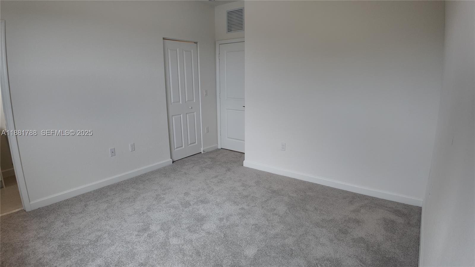 35761 Southwest 178th Court, Unit 35761 Homestead, FL 33034 - Photo 60 of 80 a view of an empty room