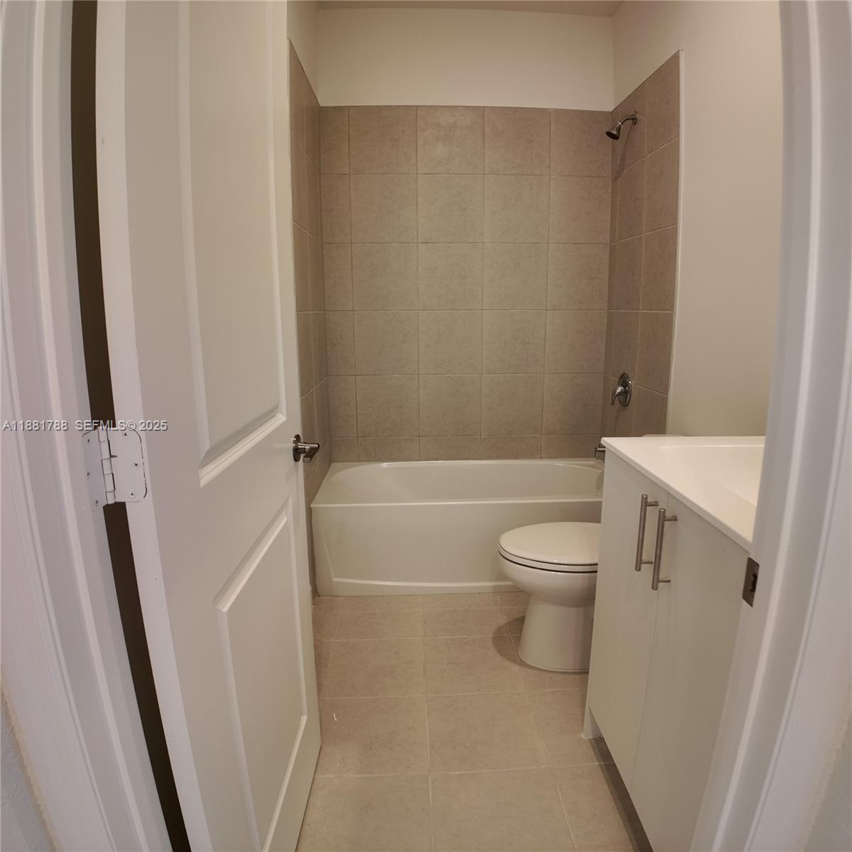 35761 Southwest 178th Court, Unit 35761 Homestead, FL 33034 - Photo 67 of 80 a bathroom with a toilet and a shower