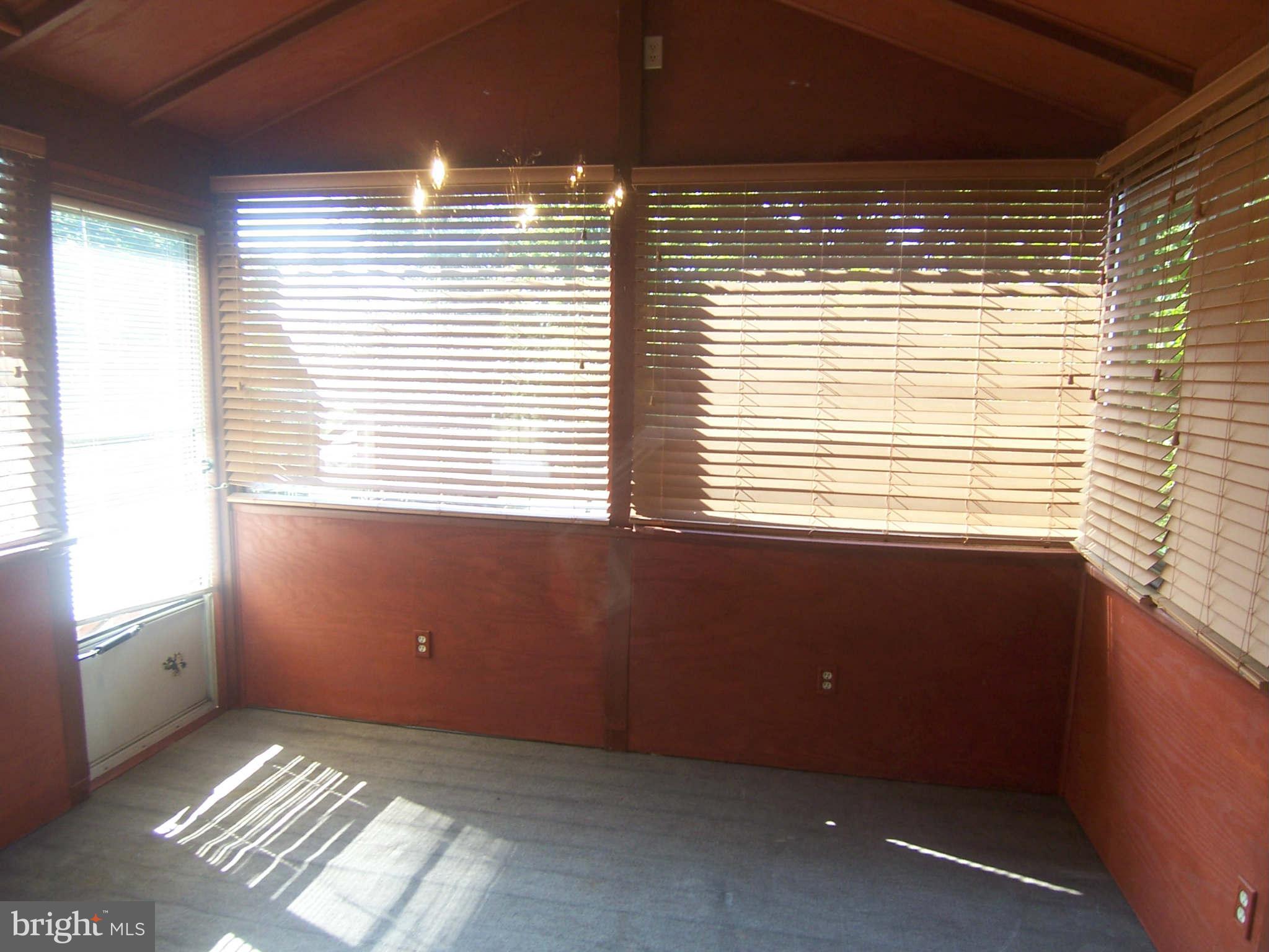 4026 Cedar Mills Road Randallstown, MD 21133 - Photo 8 of 19 Closed in Porch