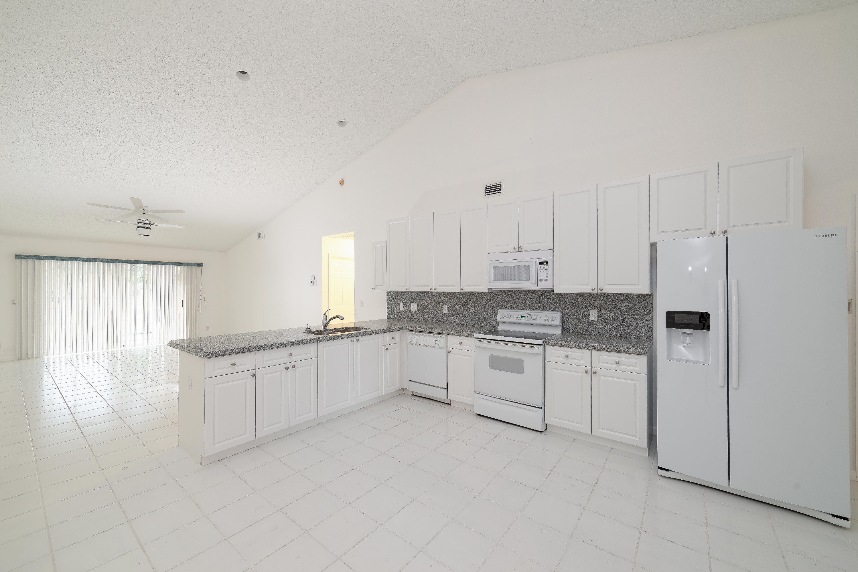 18358 Fresh Lake Way Boca Raton, FL 33498 - Photo 11 of 35 open kitchen with granite counter tops