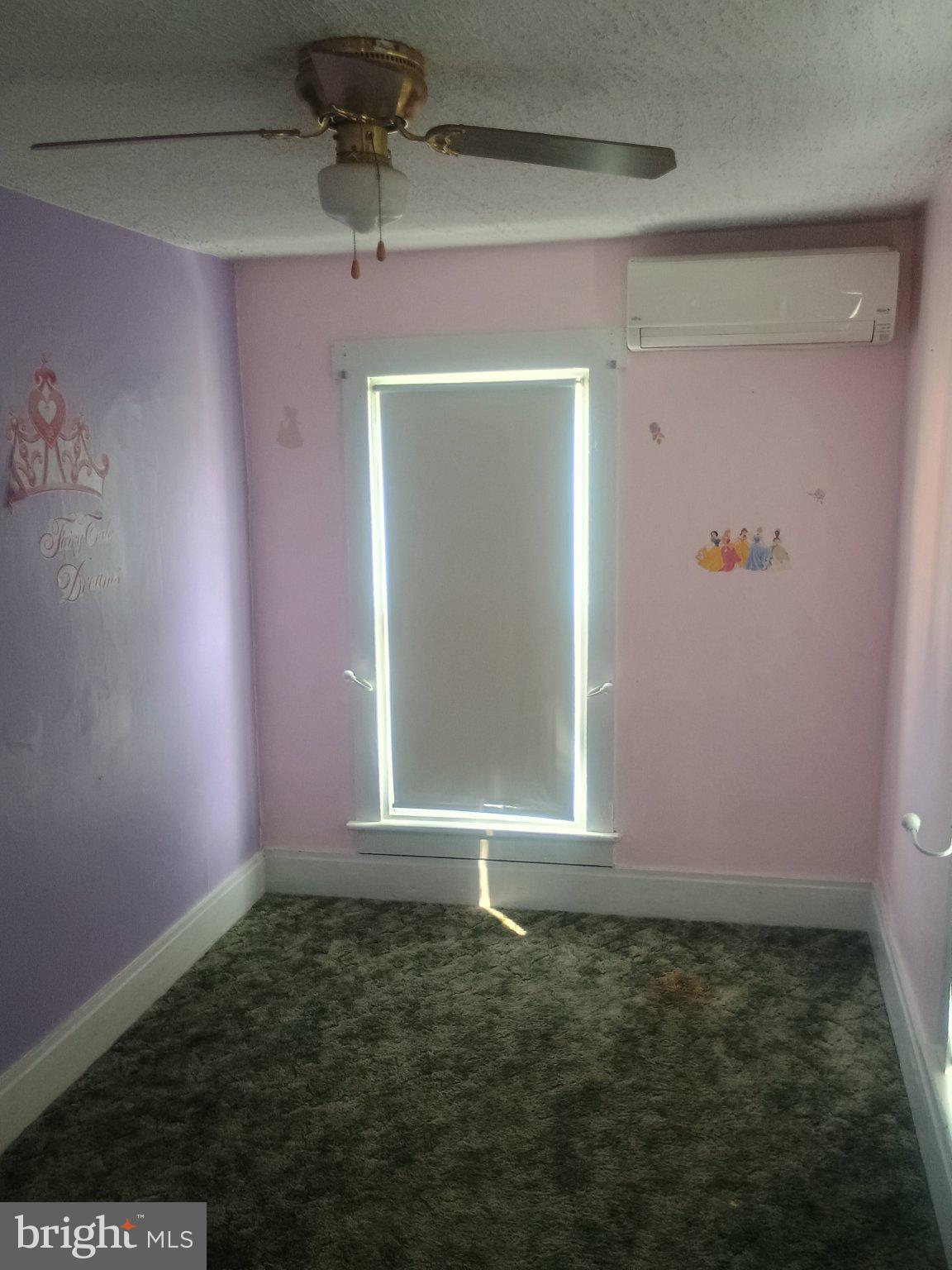 306 Ridgley Street Orbisonia, PA 17243 - Photo 12 of 21 Charming pastel room with natural light.