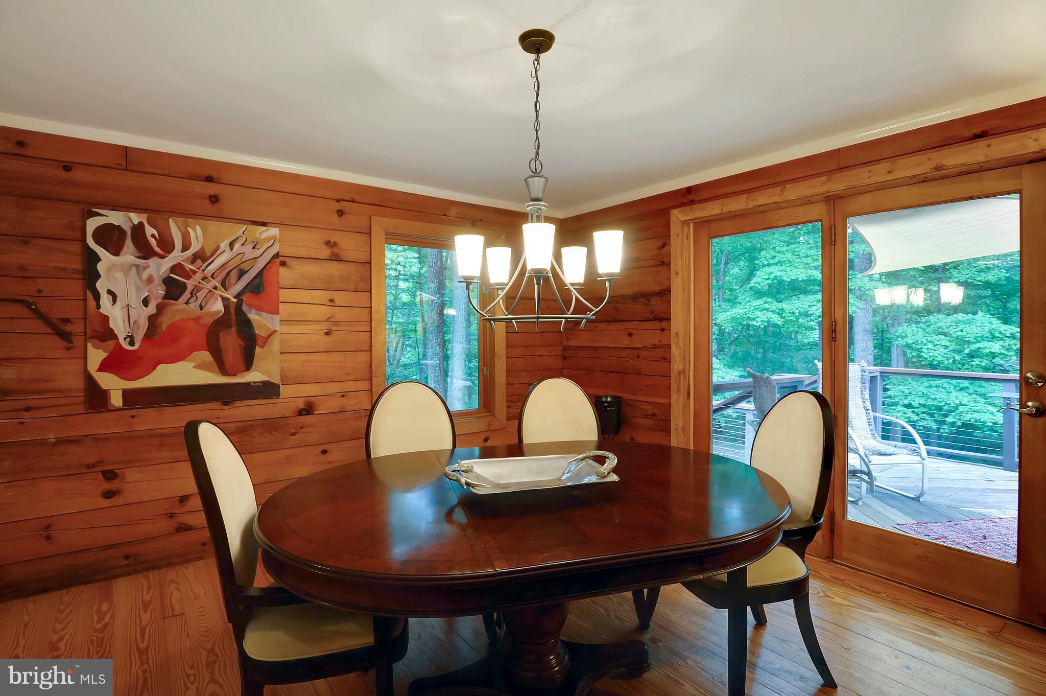 401 Farmington Road West Accokeek, MD 20607 - Photo 12 of 30 a view of a dining room with furniture window and outside view