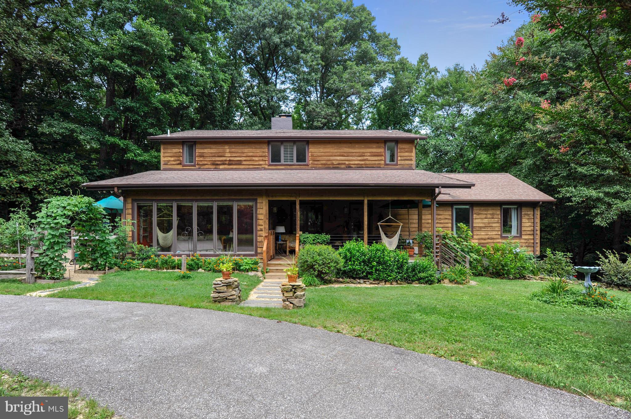 401 Farmington Road West Accokeek, MD 20607 - Photo 24 of 30 a front view of a house with a yard