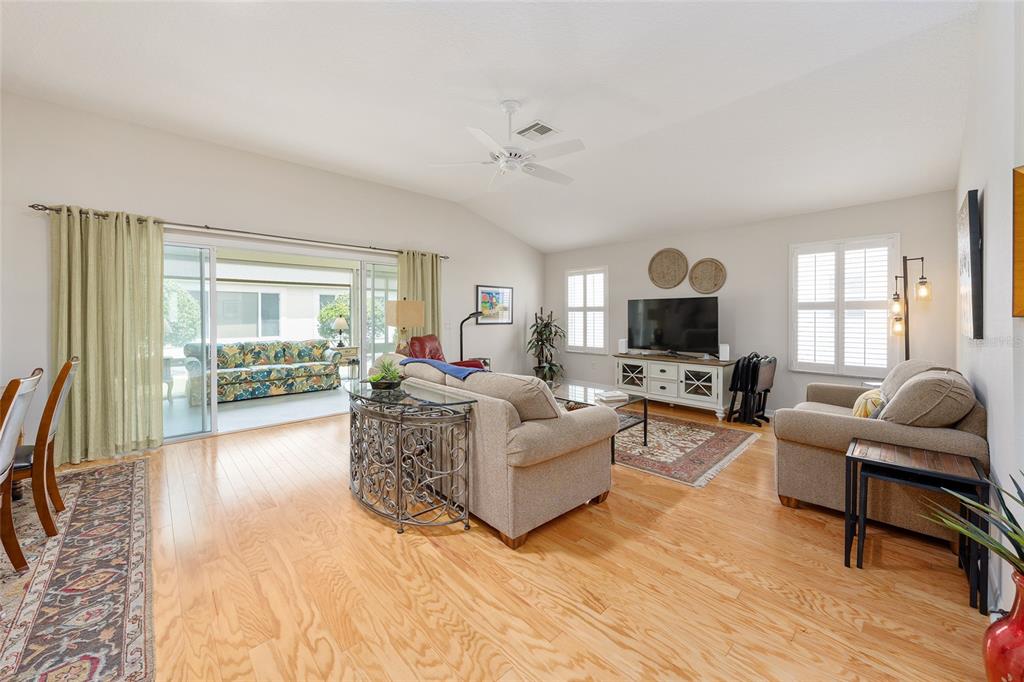 1348 Honea Path The Villages, FL 32162 - Photo 23 of 82 a living room with furniture and a flat screen tv