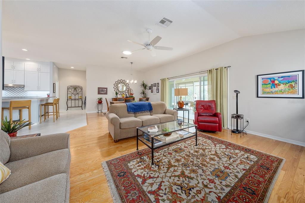1348 Honea Path The Villages, FL 32162 - Photo 25 of 82 a living room with furniture and a rug