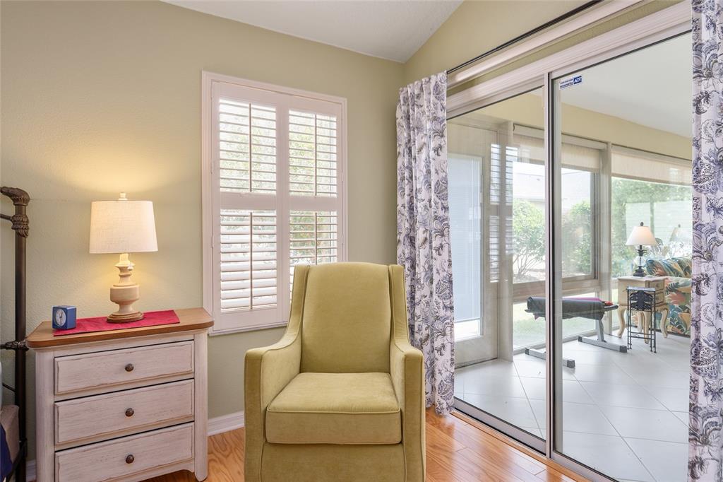 1348 Honea Path The Villages, FL 32162 - Photo 42 of 82 a living room with furniture and a large window