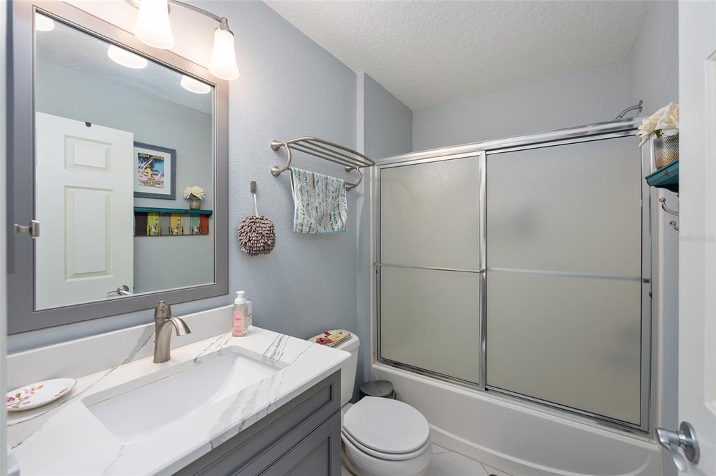 1348 Honea Path The Villages, FL 32162 - Photo 53 of 82 a bathroom with a sink a toilet and shower