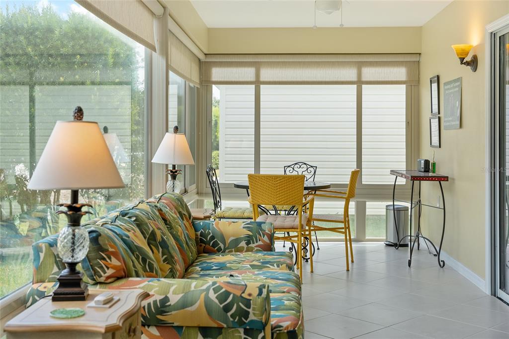 1348 Honea Path The Villages, FL 32162 - Photo 59 of 82 a living room with furniture and a window