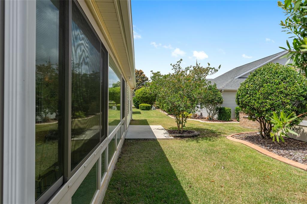 1348 Honea Path The Villages, FL 32162 - Photo 66 of 82 a view of swimming pool from a yard