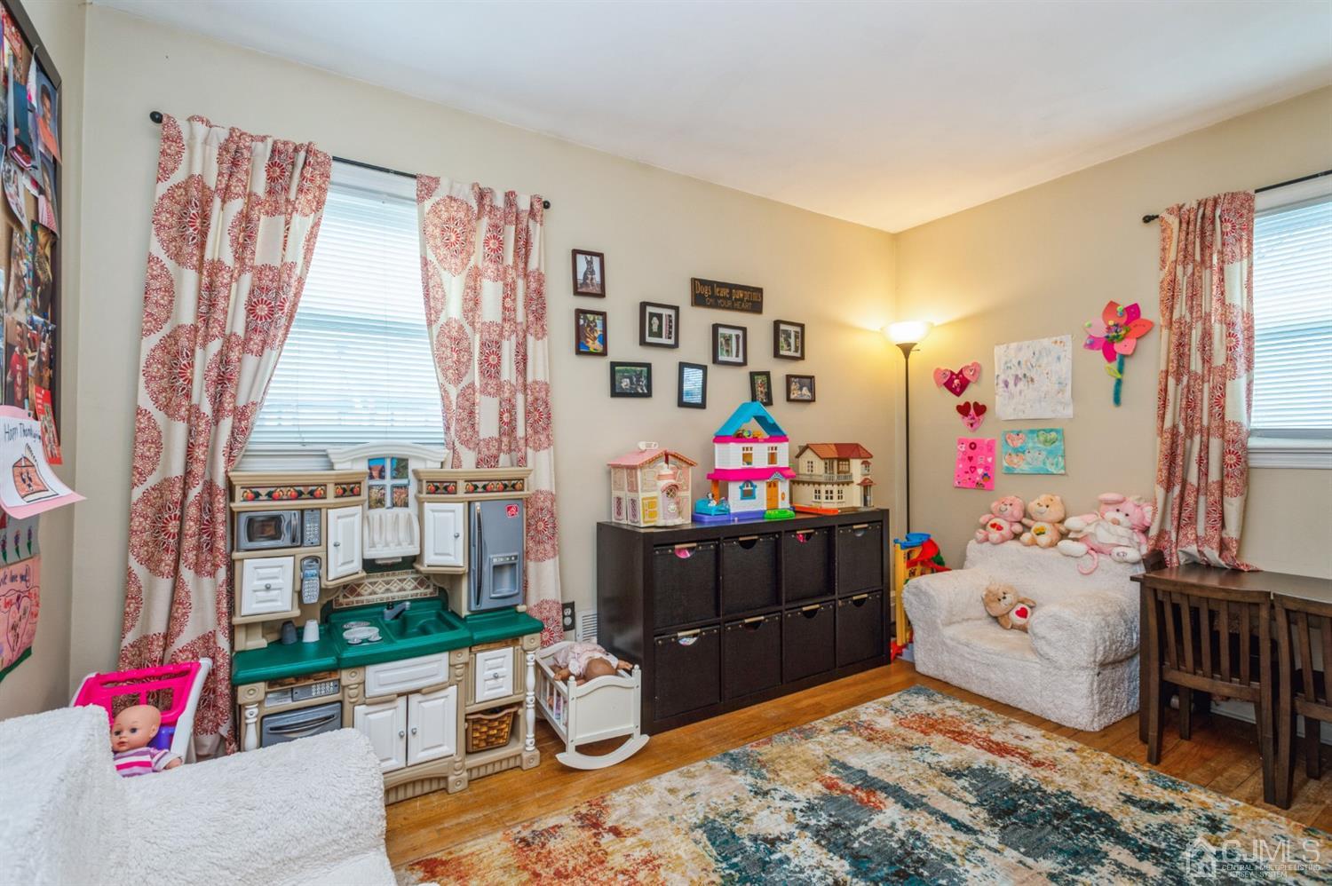 128 Old Post Road Edison, NJ 08817 - Photo 11 of 24 a bed room with a bed furniture and a couch