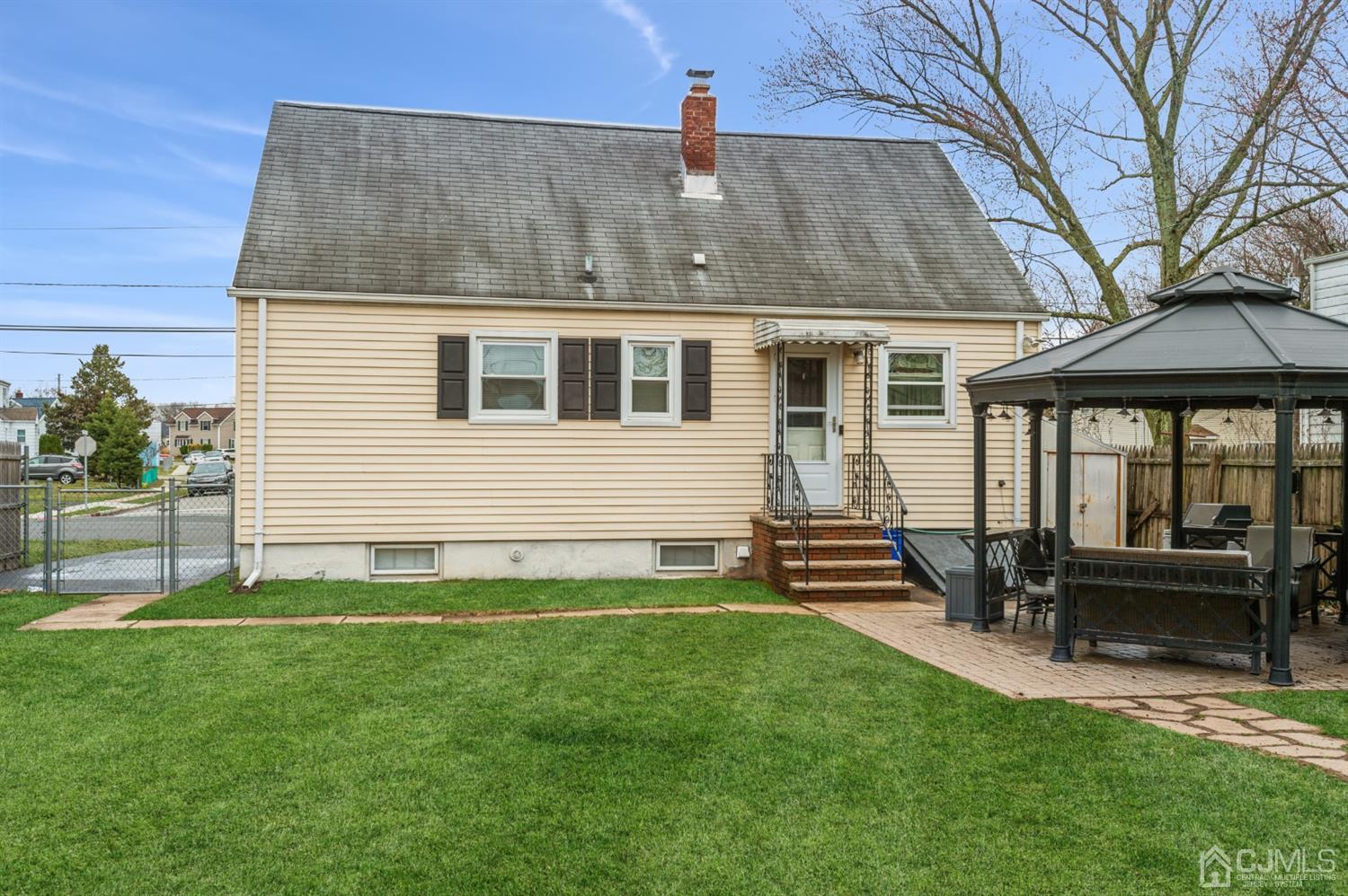 128 Old Post Road Edison, NJ 08817 - Photo 19 of 24 a front view of house with yard and seating