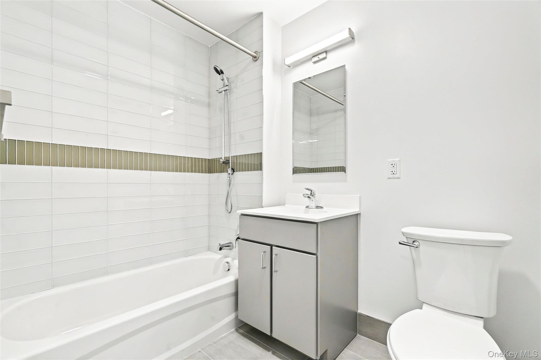 1731 Lacombe Avenue, Unit 3A Bronx, NY 10473 - Photo 25 of 29 a bathroom with a sink toilet and shower