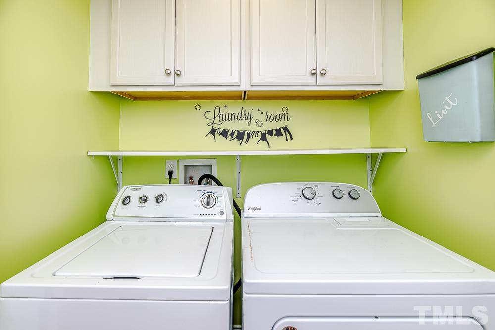 1652 Tingen Road Lillington, NC 27546 - Photo 24 of 30 a utility room with dryer and washer