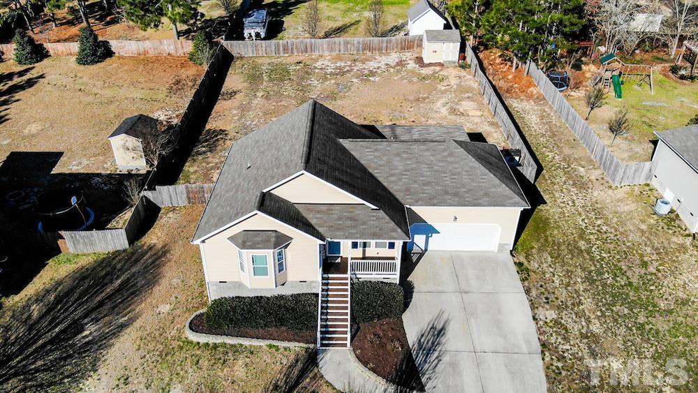 1652 Tingen Road Lillington, NC 27546 - Photo 29 of 30 an aerial view of a house with swimming pool