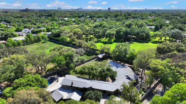 an aerial view of residential house with outdoor space