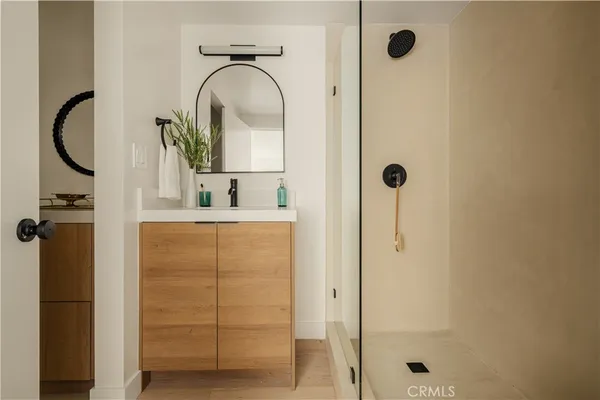 a bathroom with a sink and a mirror