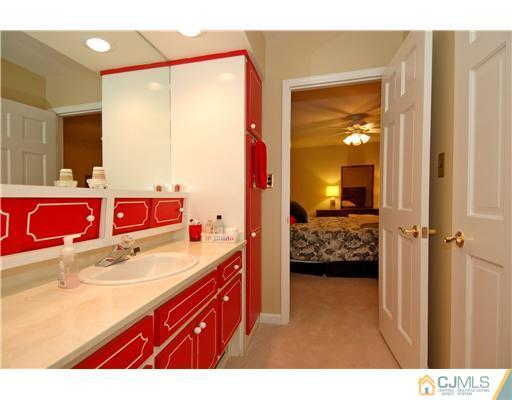148 Broadway Road Cranbury, NJ 08512 - Photo 13 of 17 a view of a bedroom with a bed