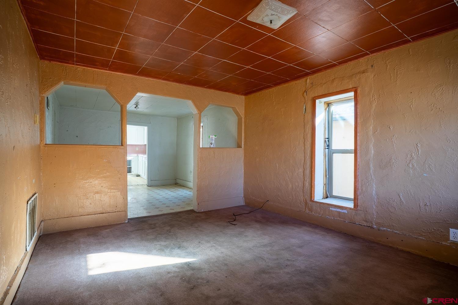 120 Browning Avenue Ignacio, CO 81137 - Photo 11 of 36 an empty room with windows