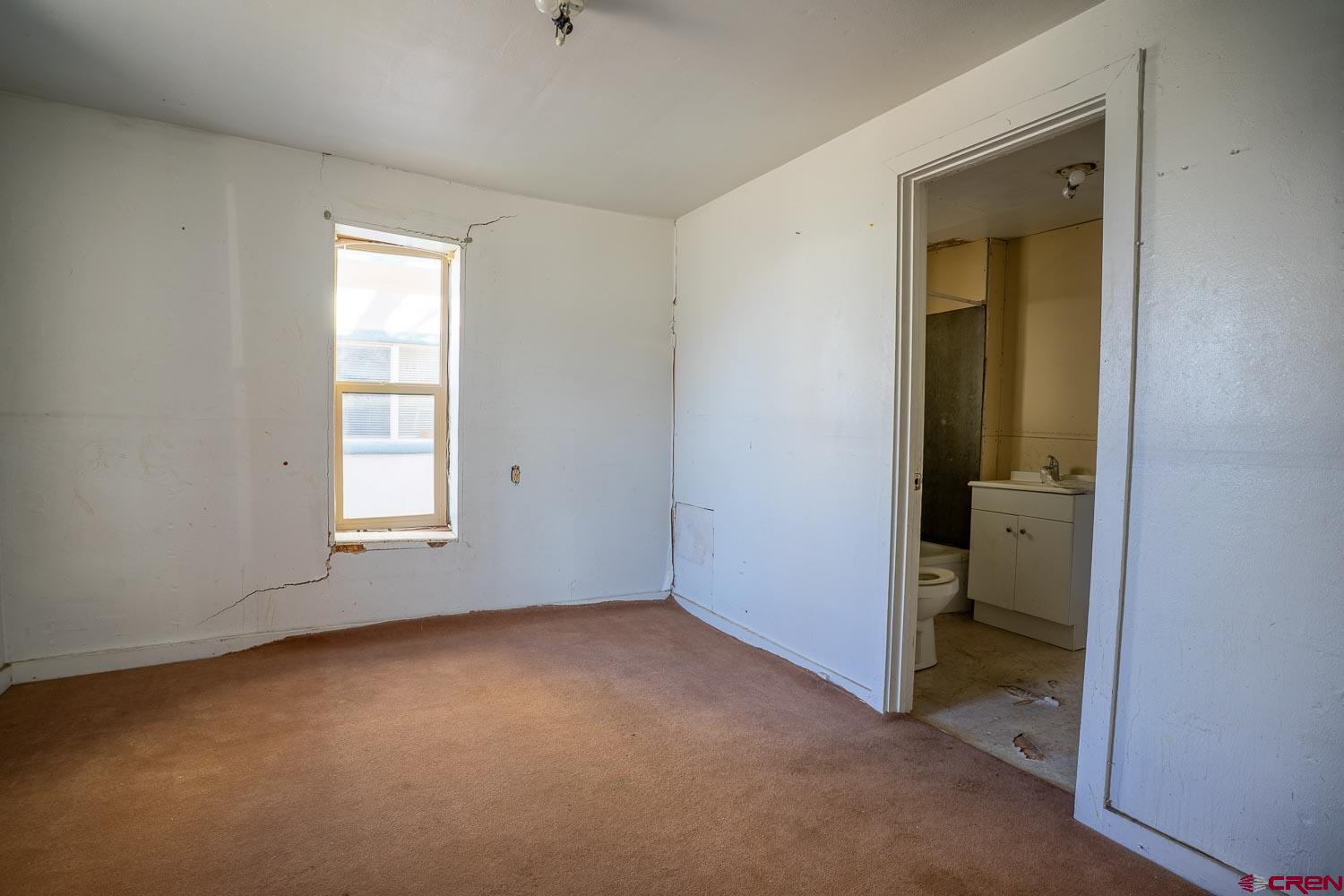 120 Browning Avenue Ignacio, CO 81137 - Photo 13 of 36 an empty room with windows