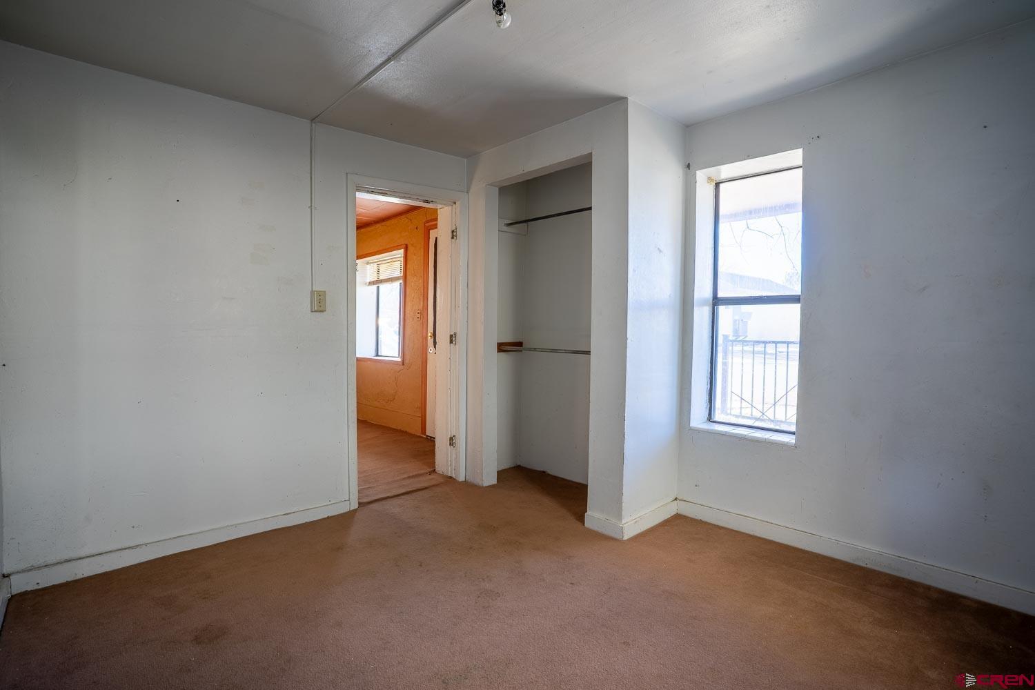 120 Browning Avenue Ignacio, CO 81137 - Photo 15 of 36 an empty room with windows