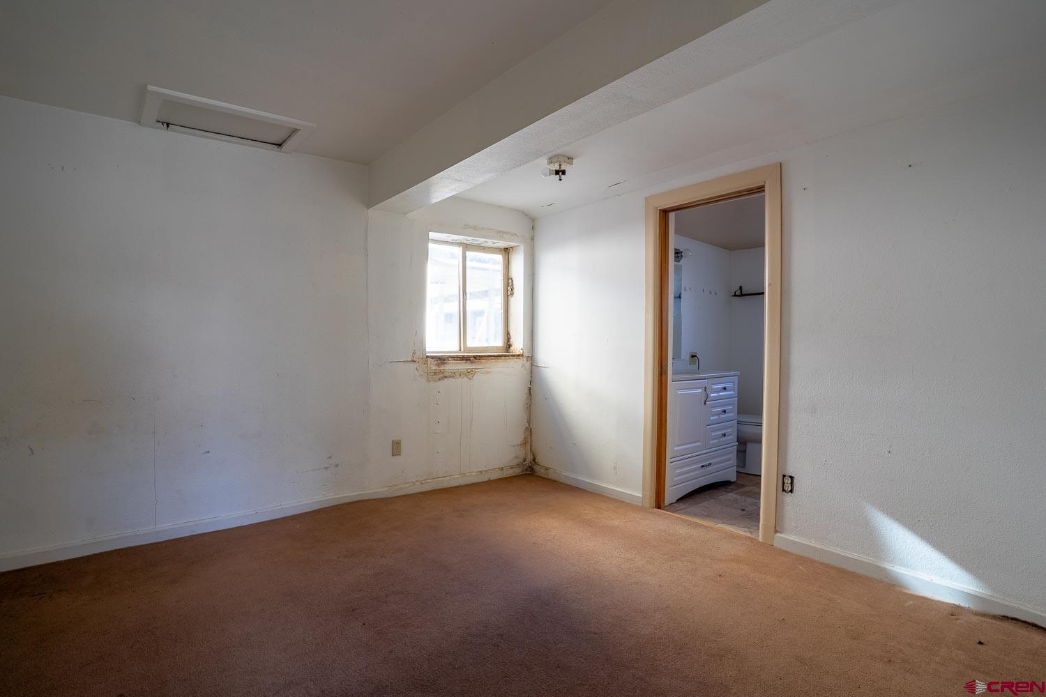 120 Browning Avenue Ignacio, CO 81137 - Photo 17 of 36 an empty room with windows