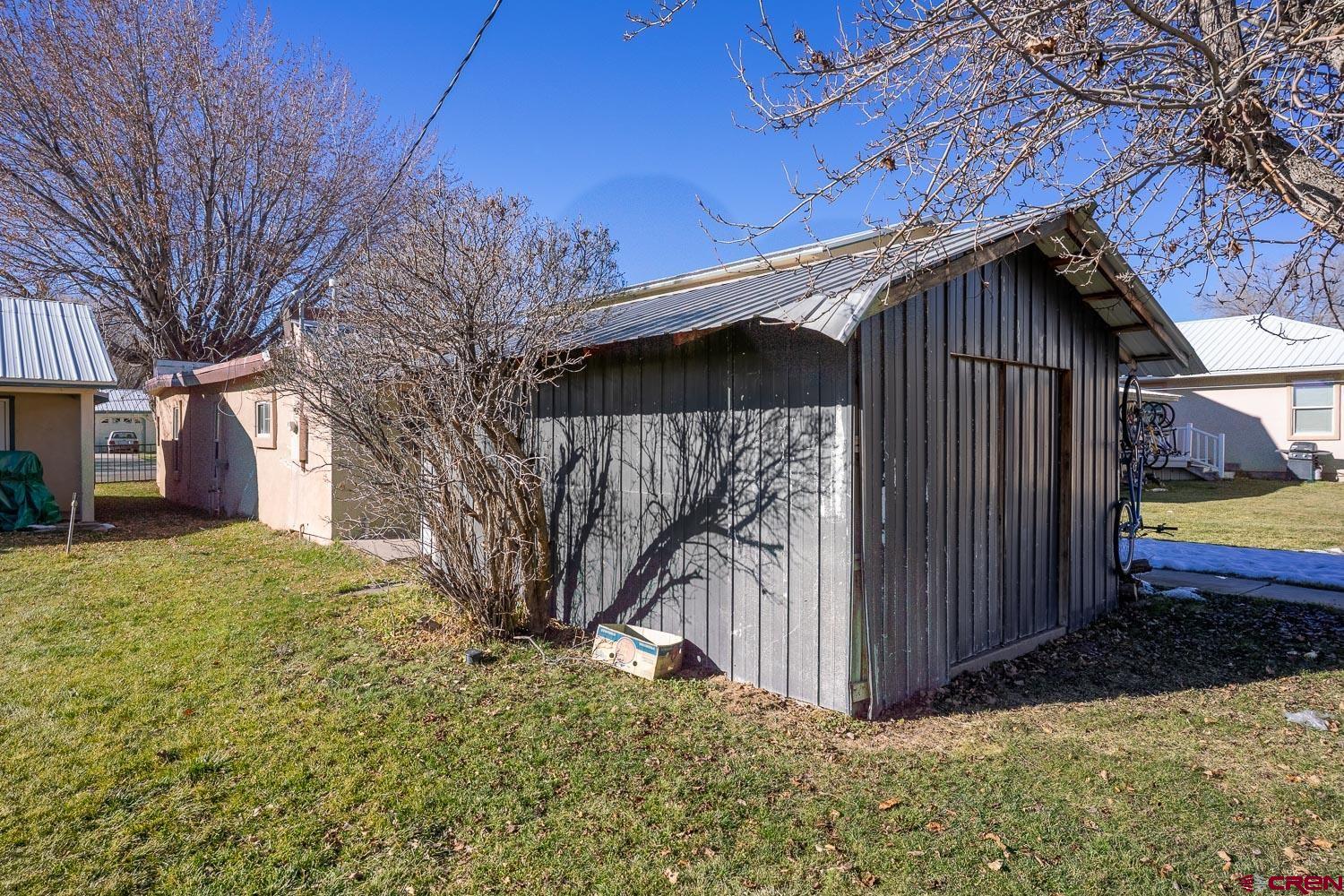 120 Browning Avenue Ignacio, CO 81137 - Photo 27 of 36 a view of a house with a yard covered with snow