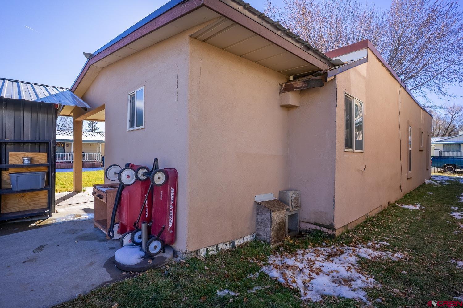 120 Browning Avenue Ignacio, CO 81137 - Photo 29 of 36 a view of a house with backyard and entertaining space