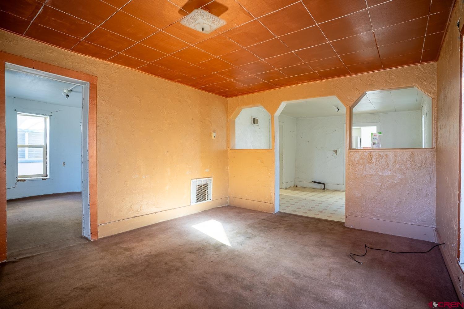 120 Browning Avenue Ignacio, CO 81137 - Photo 9 of 36 an empty room with windows