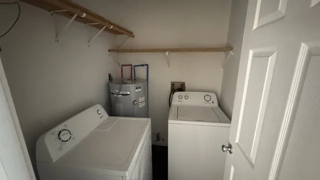 a utility room with dryer and washer