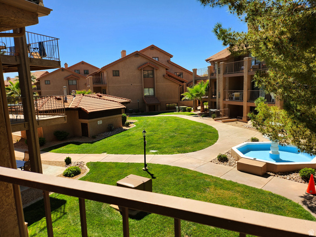 860 South Village Road, Unit Z10 St. George, UT 84770 - Photo 13 of 18 View of community with a balcony and a patio area