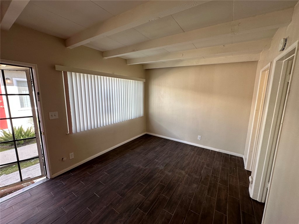 1015 North Azusa Avenue, Unit 6 Azusa, CA 91702 - Photo 11 of 18 an empty room with wooden floor and windows