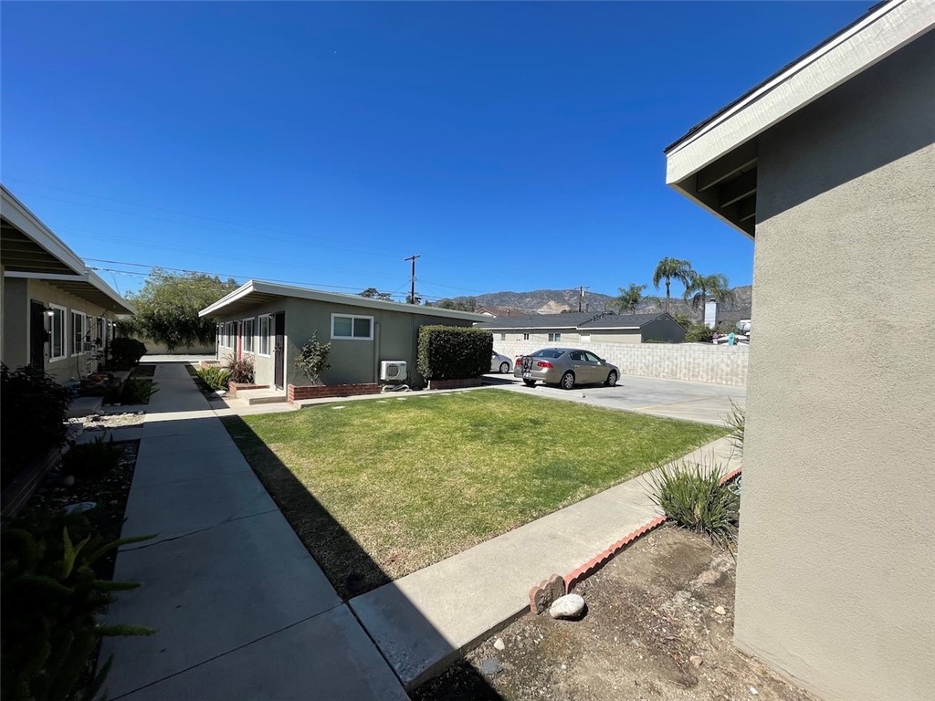 1015 North Azusa Avenue, Unit 6 Azusa, CA 91702 - Photo 16 of 18 a view of outdoor space yard and deck