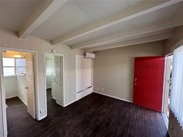 a bathroom with a bathtub and shower