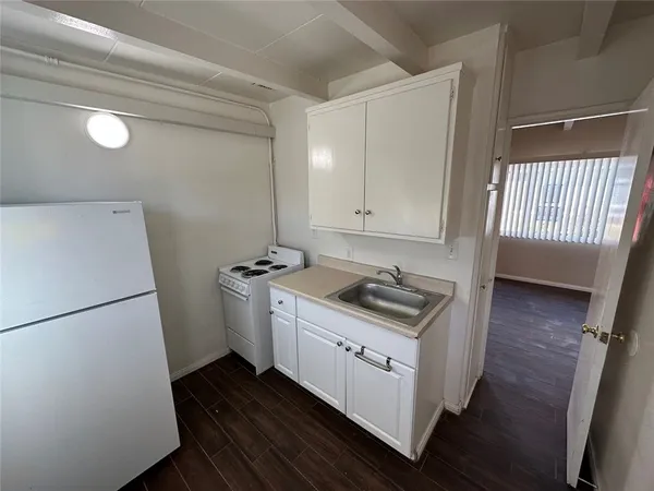 a bathroom with a sink and a large mirror