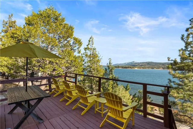 a view of a chairs and table on the wooden floor
