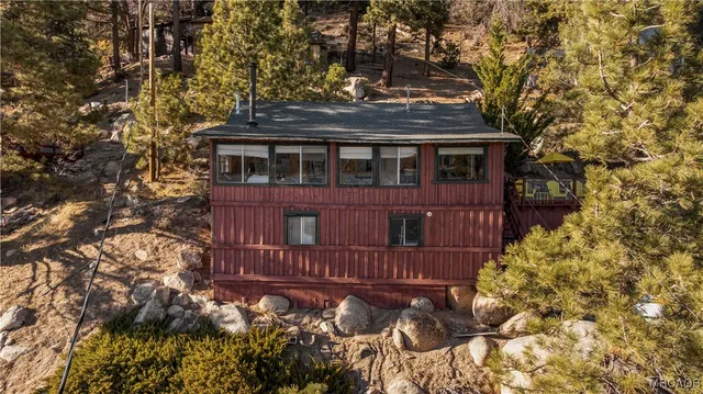 front view of a house with a small yard