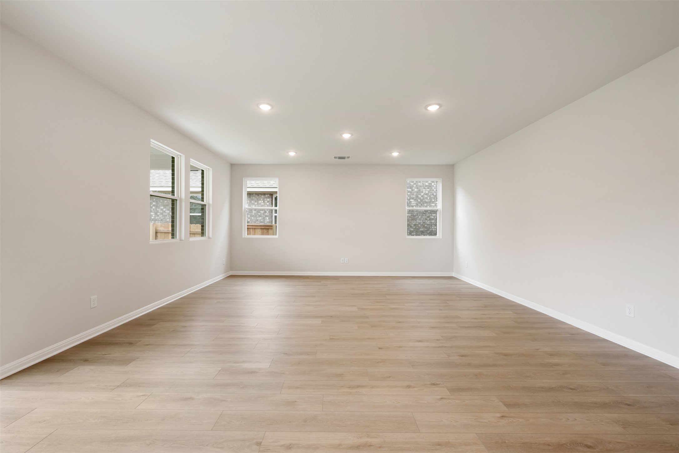 1832 Fannie Road Georgetown, TX 78633 - Photo 14 of 40 a view of empty room with wooden floor and fan