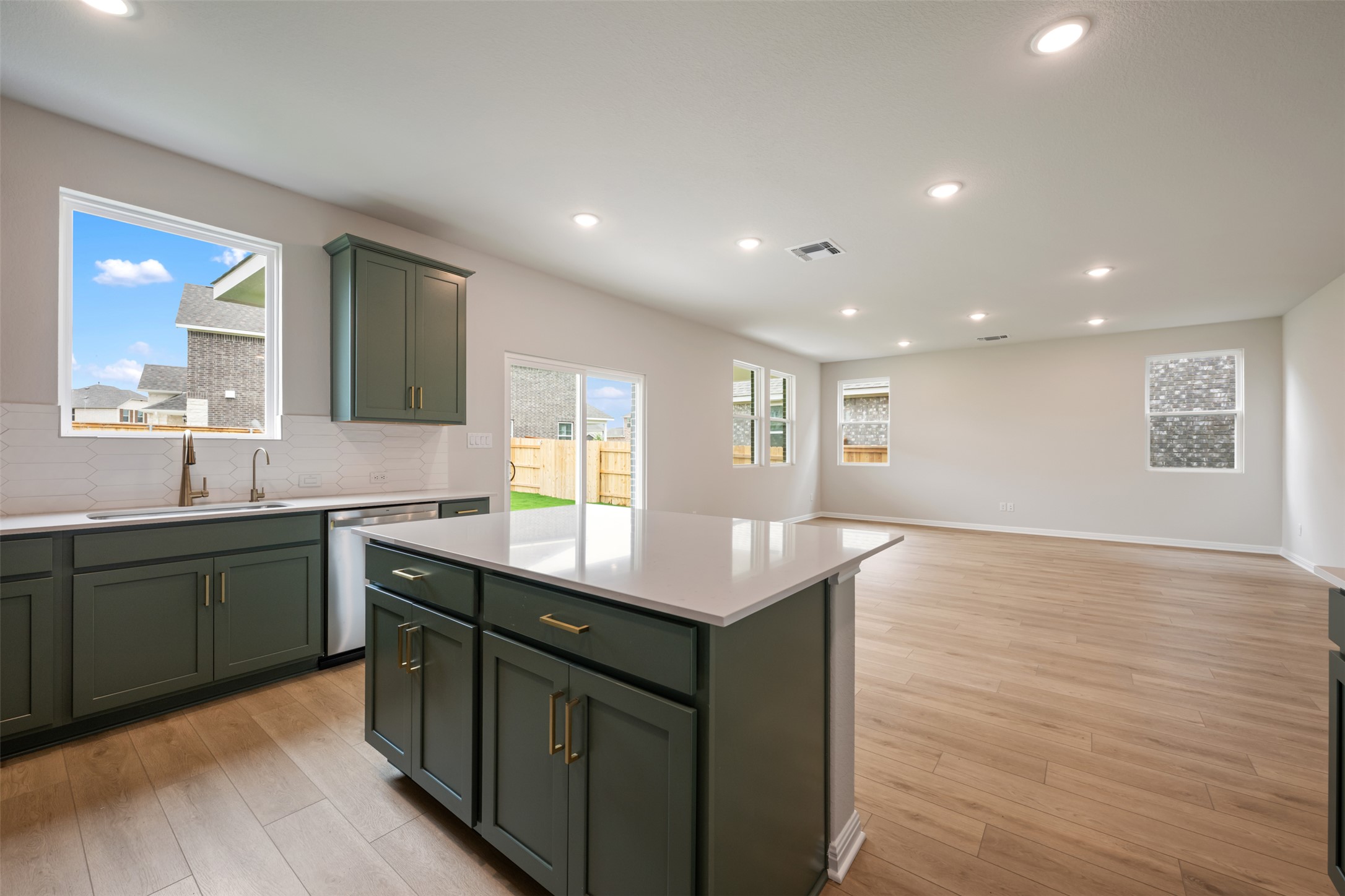 1832 Fannie Road Georgetown, TX 78633 - Photo 23 of 40 a kitchen with counter top space sink and center island