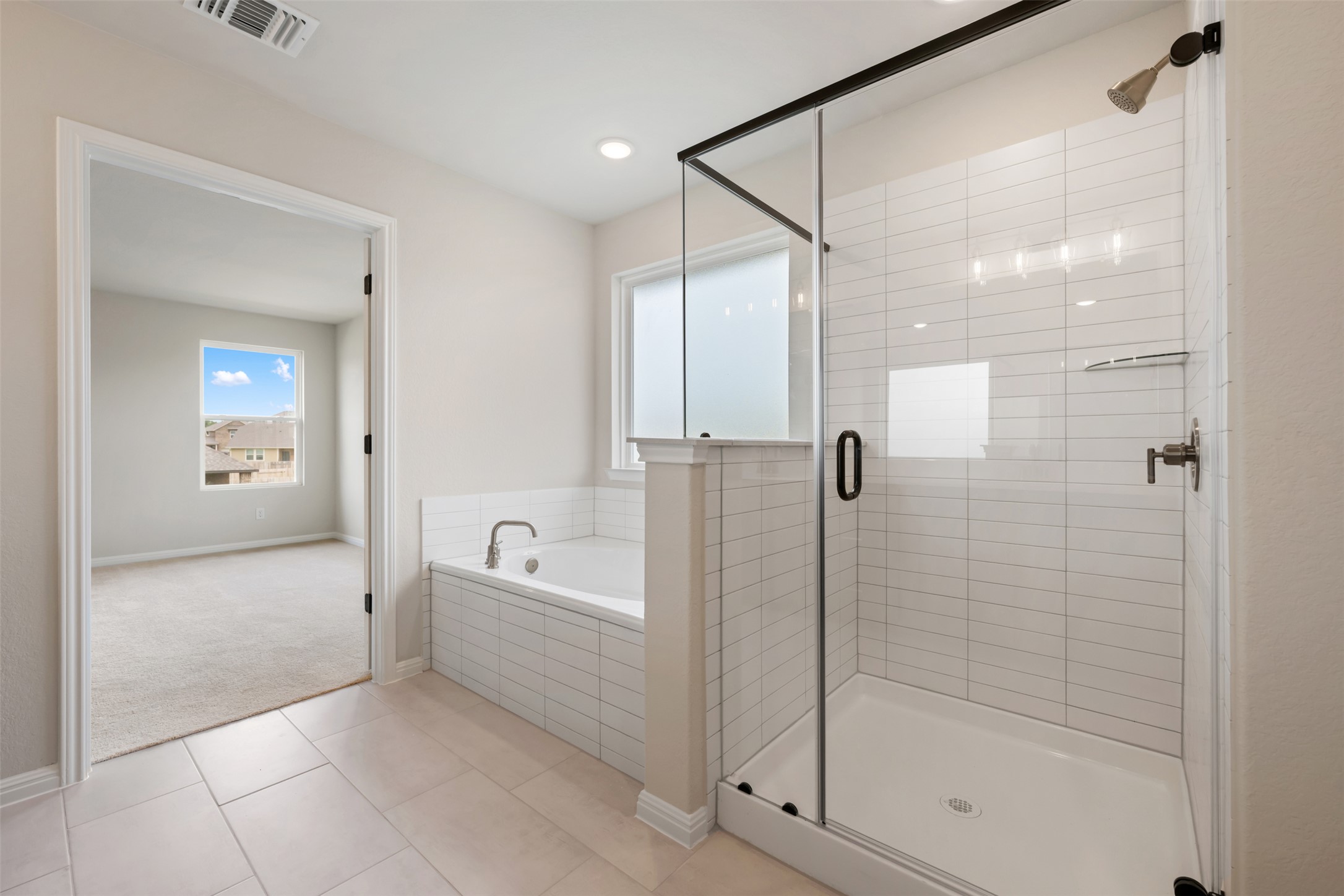 1832 Fannie Road Georgetown, TX 78633 - Photo 35 of 40 a bathroom with a bathtub and a shower