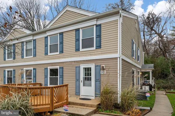 a front view of a house with a porch