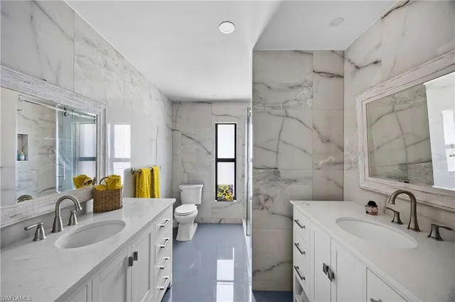 a bed room with a bed and a window