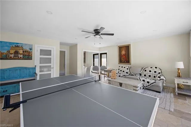 a utility room with cabinets washer and dryer