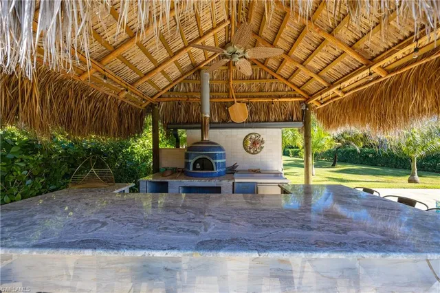 a view of a backyard with swimming pool