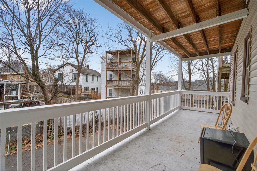 29 East Street, Unit 2 Boston, MA 02122 - Photo 12 of 15 a view of a porch with furniture