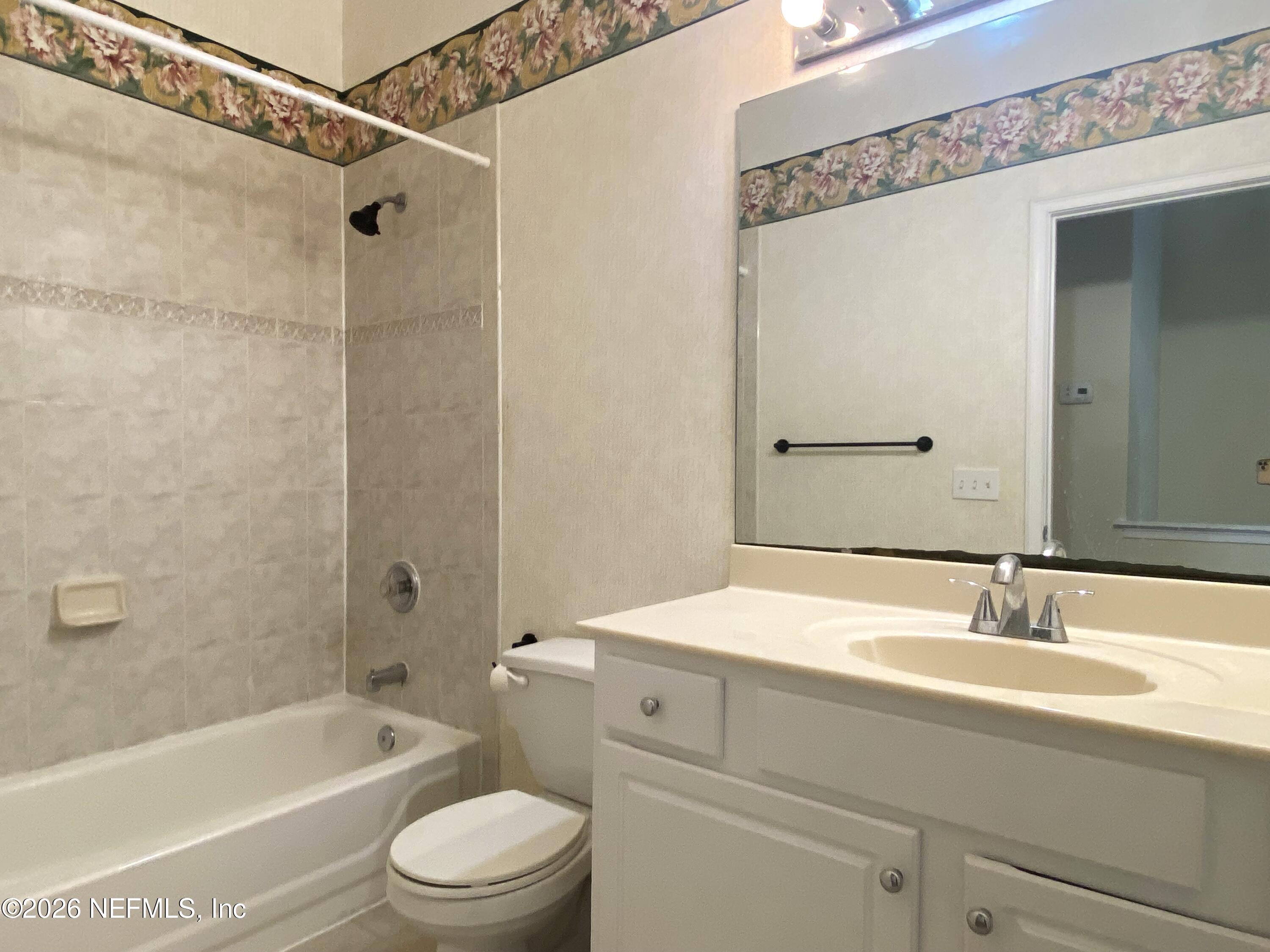 120 Seminole Road Atlantic Beach, FL 32233 - Photo 11 of 21 a bathroom with a sink a toilet and a bathtub