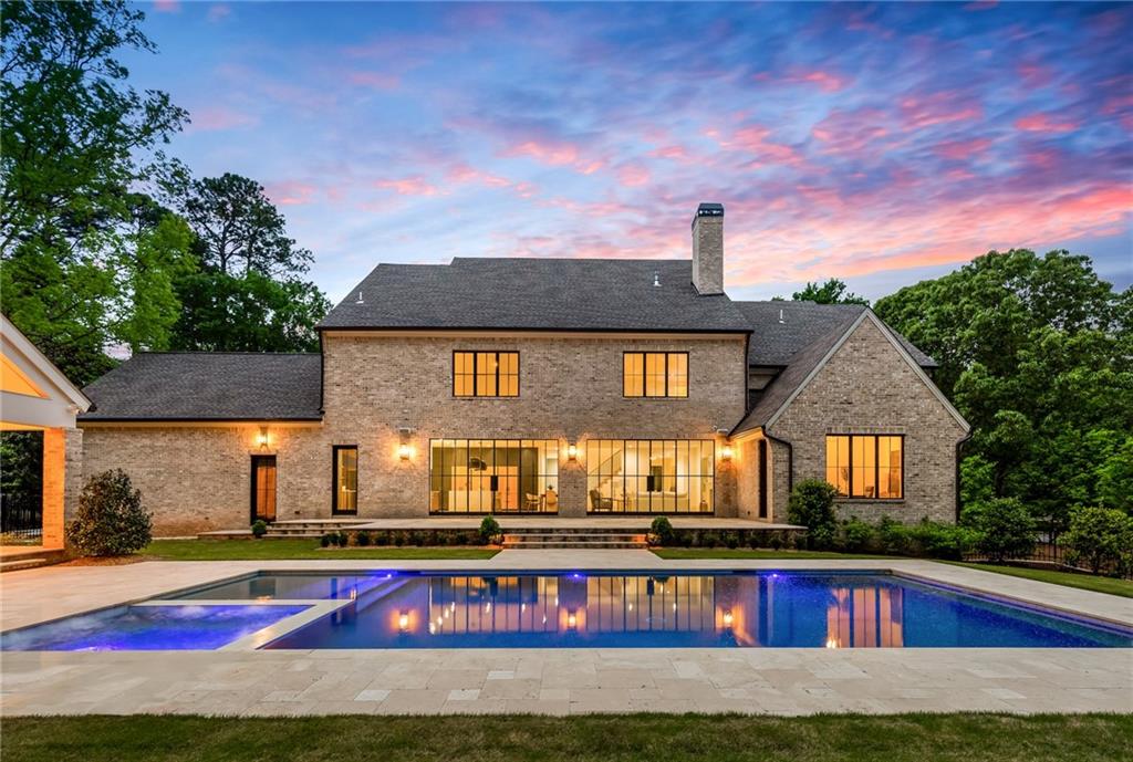 a front view of house with yard and seating space