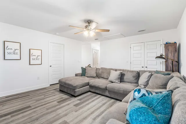 a en suite bathroom with double vanity and mirrors