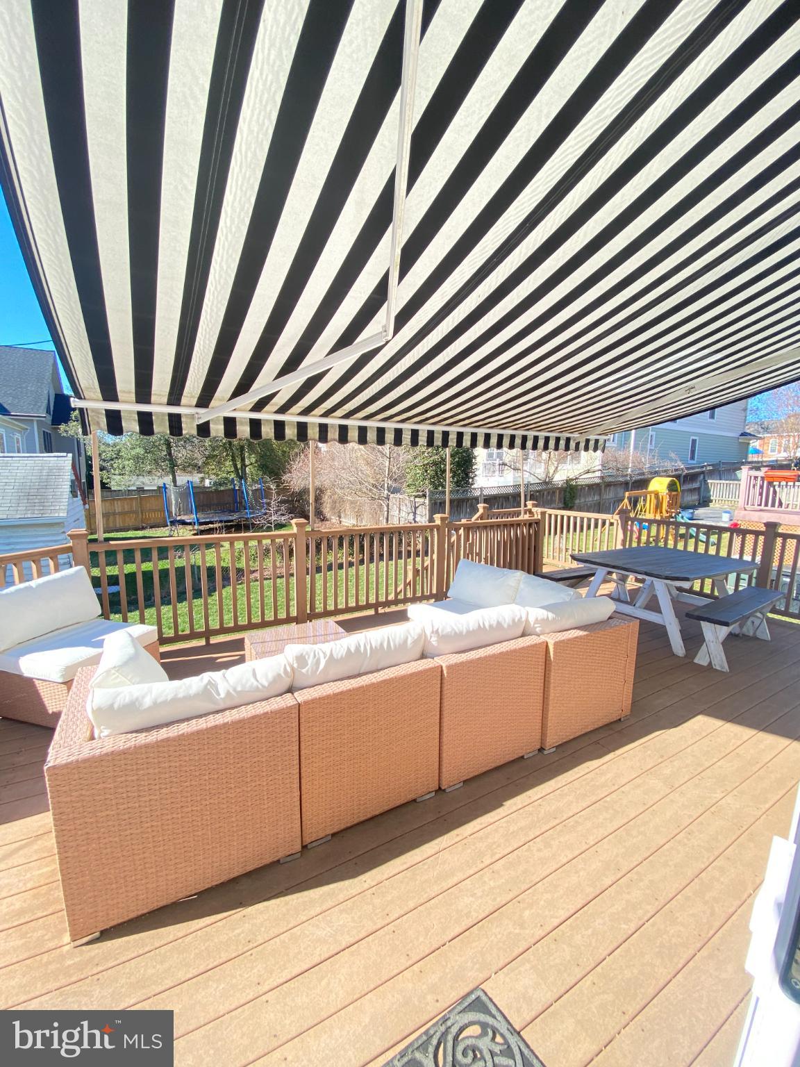 1406 North Glebe Road Arlington, VA 22207 - Photo 15 of 20 Sunny patio with stylish striped awning.